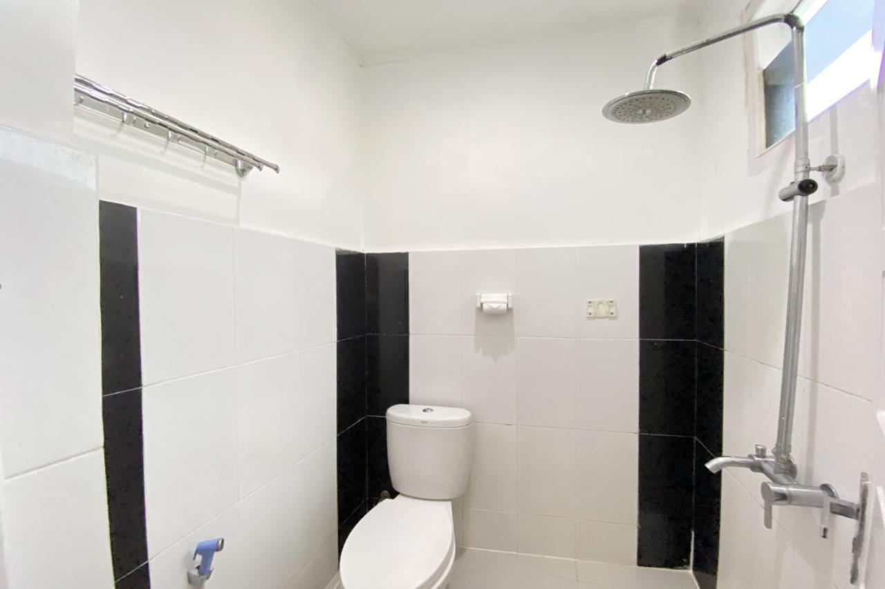 Hotel Ananda Syariah Redpartner ブキティンギ エクステリア 写真